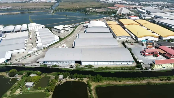 Aerial view of a Bang Bo warehouse and factory complex with multiple buildings and surrounding waterways.