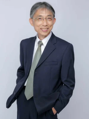 Smiling man in suit. Possibly a Board of Director member.